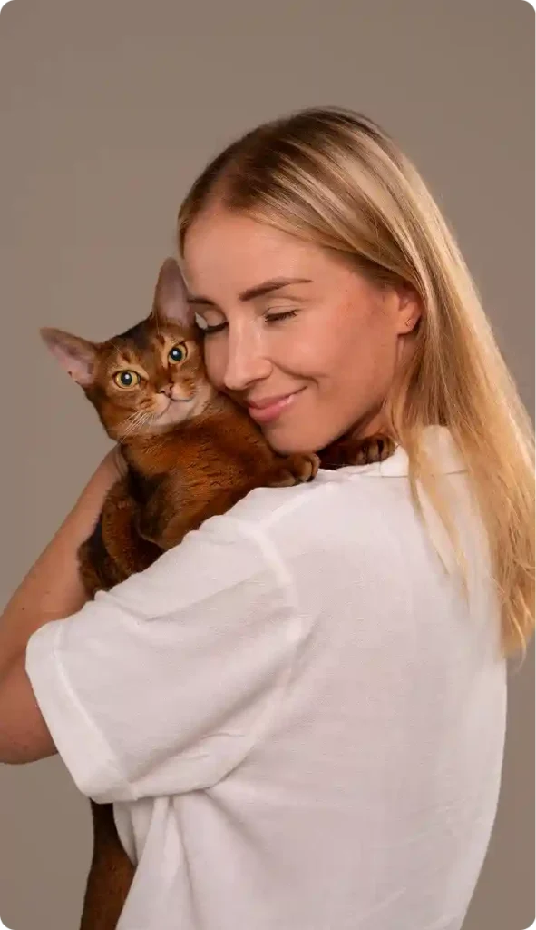 María C. y Pepe, su gato